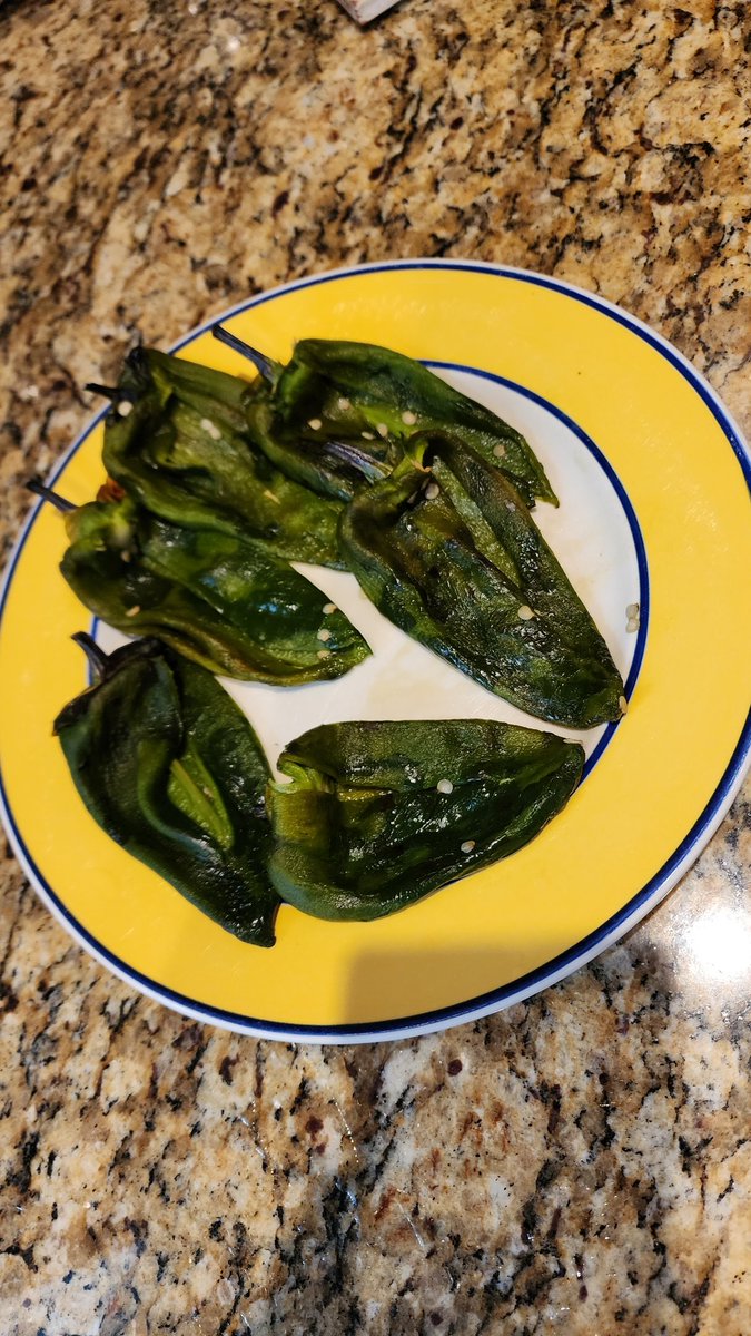 OK. They're roasted & peeled & ready for stuffing with deliciousness & to be dipped in the batter & fried into something subliminally good, nested on some fresh ranchero sauce with sprinkle of extra queso fresco. 

#HappyIndictmentDay poblano chilies