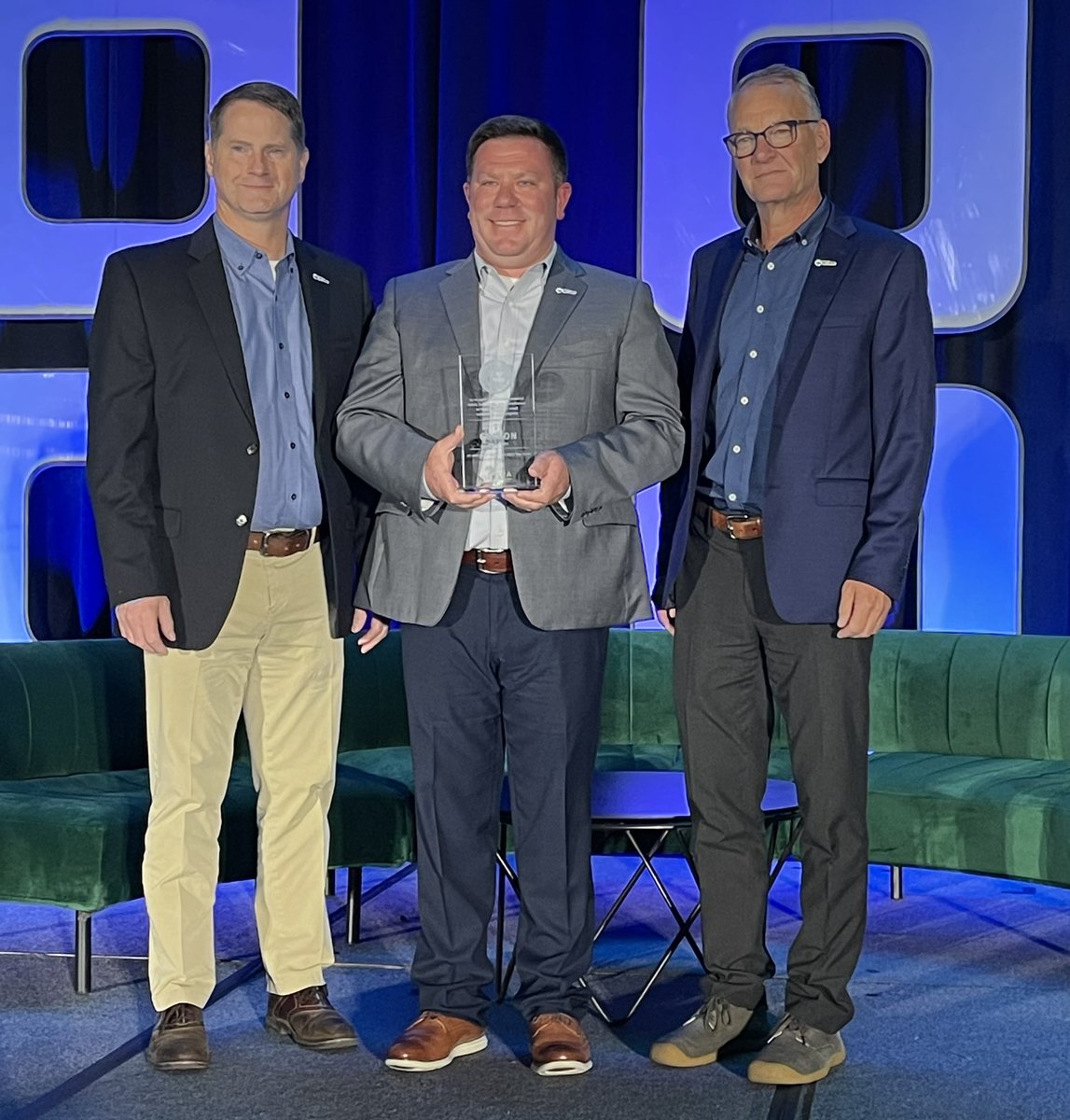 The team is networking with retailers &amp; partners, soaking in the info, but our highlight at the Independents Conference is TJ honored with an award.  Bart, Wilco CFO, and Sam, CEO, stand with TJ, President of Stores, holding the <a href="/Your_NHPA/">NHPA</a> 2023 Top Gun award.  Congratulations.