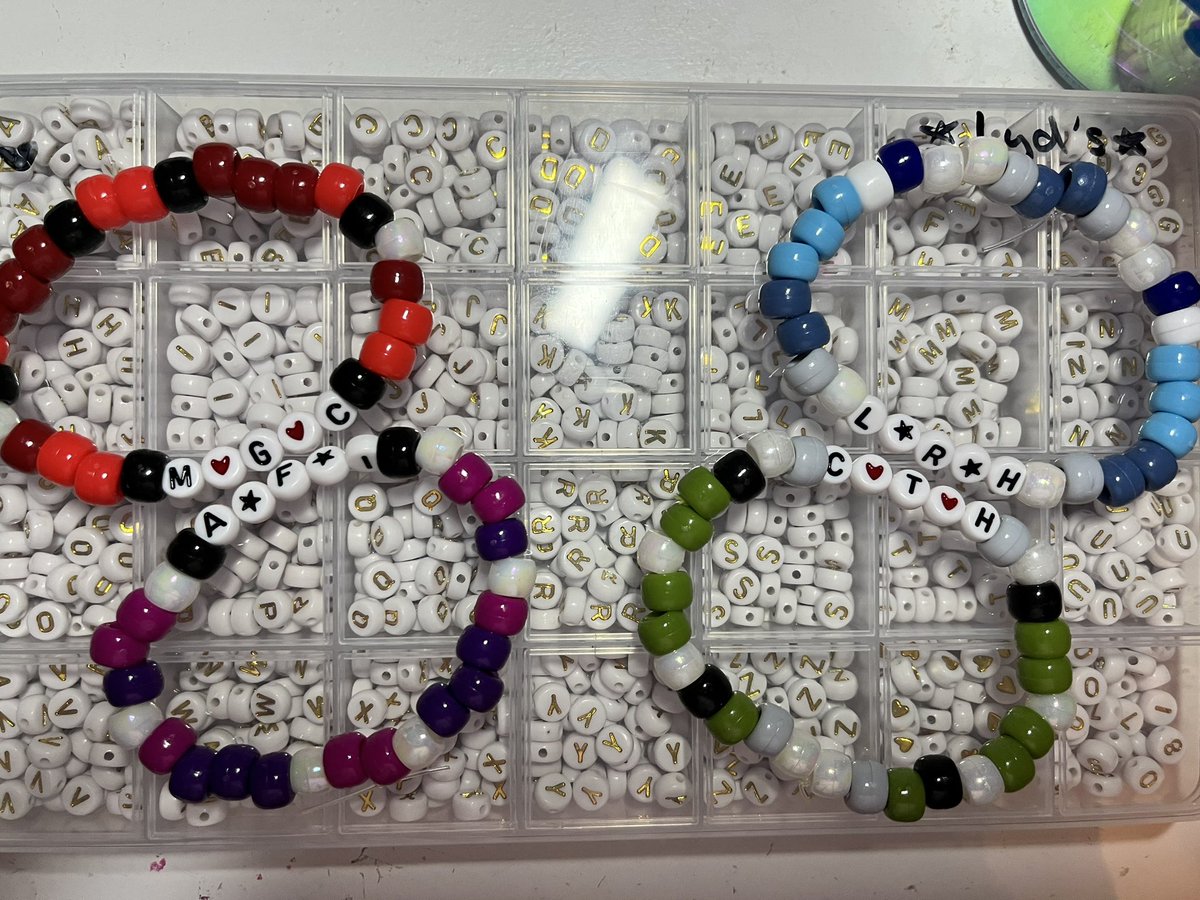 cowboylikelyd's tweet photo. some rlly bad pics of some bracelets i’ve made for the 5sos shows !! (bristow and philly) #5sosbracelets (im at 35 so far) https://t.co/0LJfPlDqts
