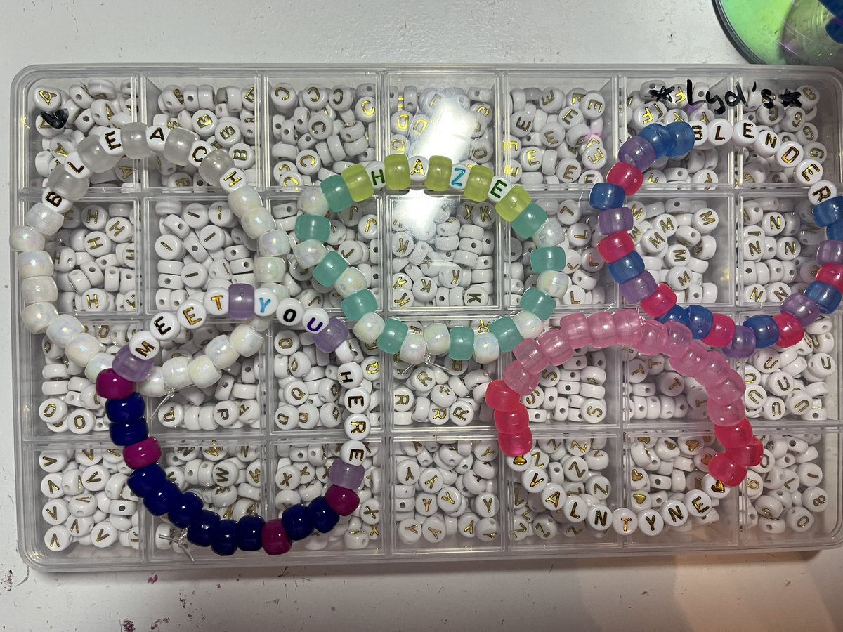 cowboylikelyd's tweet photo. some rlly bad pics of some bracelets i’ve made for the 5sos shows !! (bristow and philly) #5sosbracelets (im at 35 so far) https://t.co/0LJfPlDqts