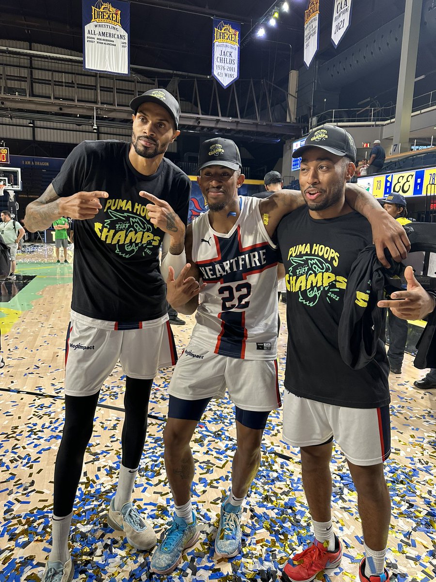 thetournament's tweet photo. FROM G LEAGUE TEAMMATES TO TBT CHAMPIONS 🏆🏆🏆 @TEAMHEARTFIRE 

Raphiael Putney, Craig Sword, and John Gillon now have their names cemented in history. https://t.co/nWS3hKzXKn