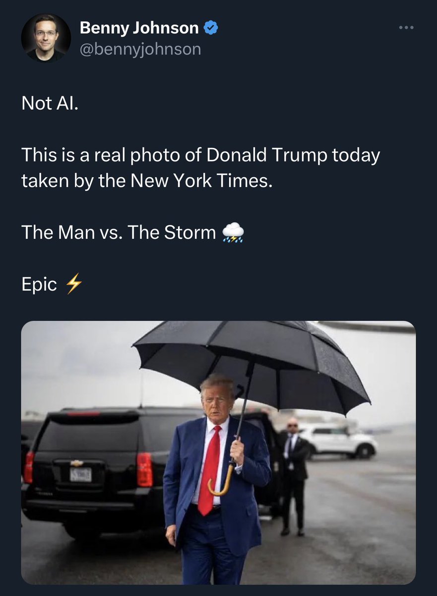 ? He’s holding a fucking umbrella man