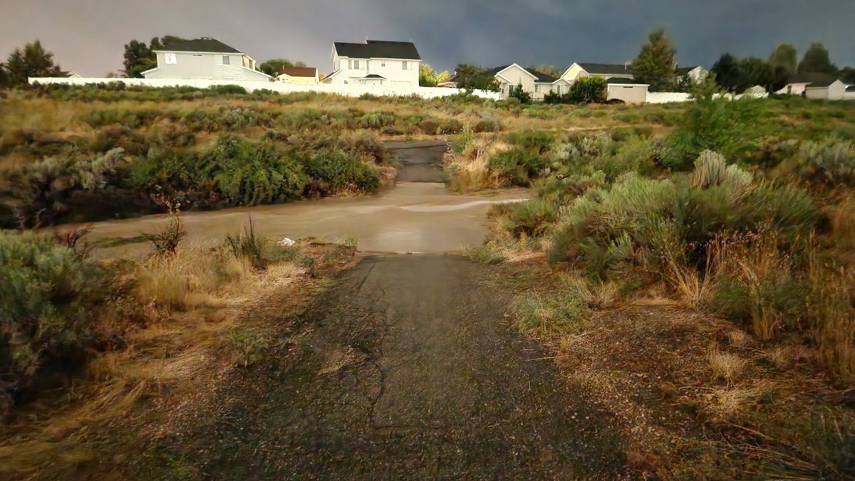 Slimj77's tweet photo. @ProfessorPowder Came right over us in Herriman.  I've never seen so much lightning going off at once.  Dumped a ton of rain too.  Here's the almost always dry Midas Creek.  Running fast and probably 4-5 ft deep in the middle https://t.co/MfvsEbn3PK