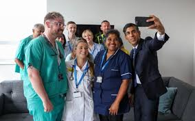 JohnEtheridge79's tweet photo. Why do these people agree to pose with these people that are actively ruining their lives, or making working/volunteering in a foodbank a necessity #Makemeunderstand https://t.co/tKC4vv3ux2