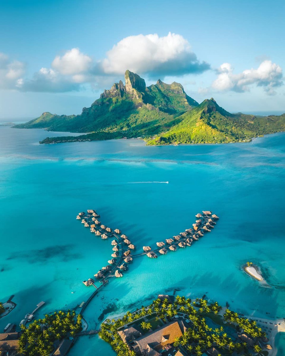 Embark upon a vibrant turquoise adventure at Bora Bora Island — jewel of the south sea, located in #FrenchPolynesia! More than just a romantic ideal, you will discover an endless bucket-list encounters made for ocean lovers or hikers! 

📷 : <a href="/fsborabora/">Four Seasons Bora Bora</a>
