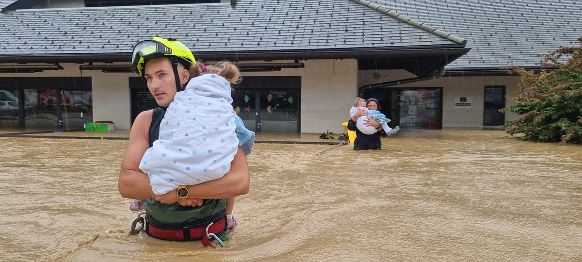 JAtanackov's tweet photo. #Floods up close and personal - evacuation of children in a flooded kindergarten in Mengeš, central #Slovenia. Photo: PGD Mengeš https://t.co/u9aMgK3Kq1