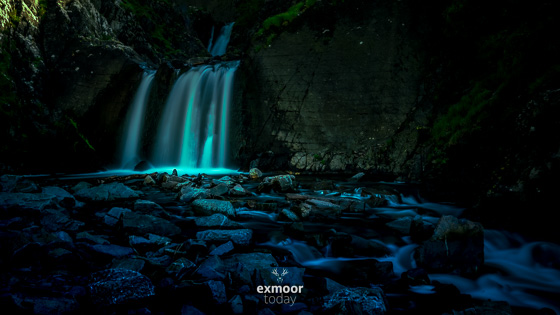 Sunlight shines on a Devon coastline waterfall. Click to go large - exmoor.today/20230804

#devon #exmoor #waterfall