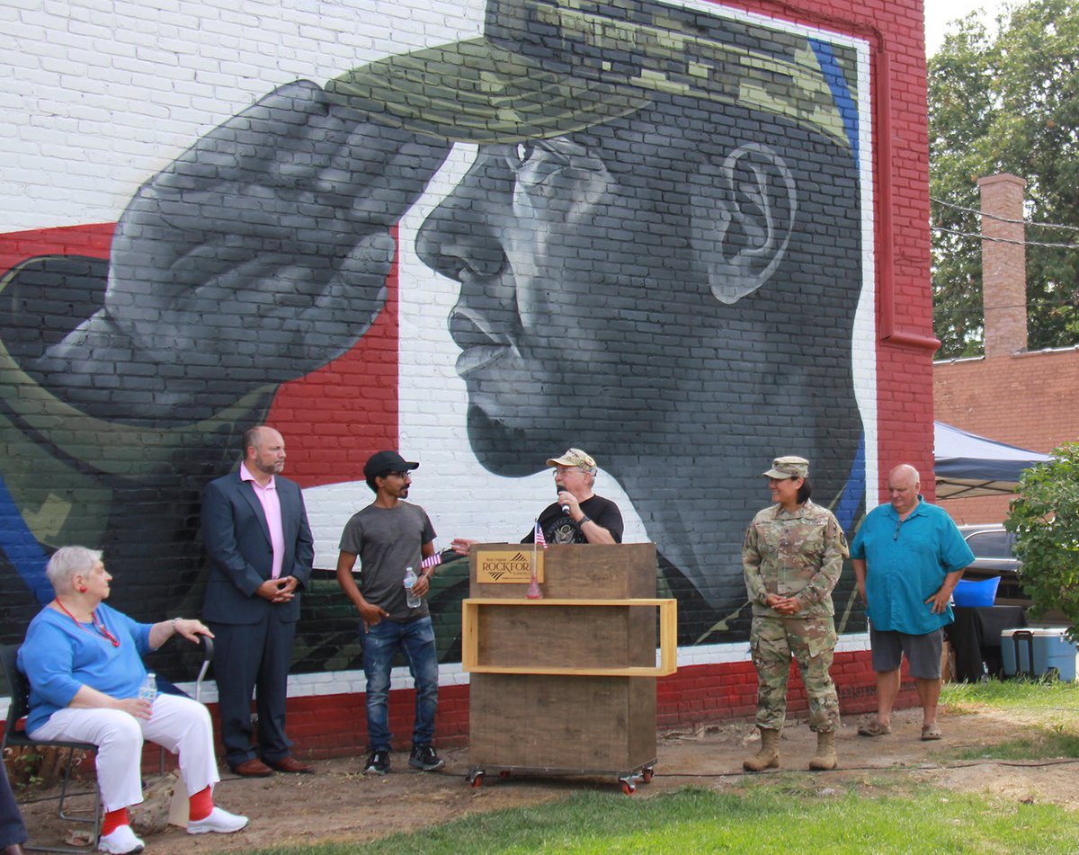 gorockford's tweet photo. RACVB hosted a CRE8IV mural dedication and flag-raising ceremony at Veterans Memorial Circle. The new display salutes America’s veterans and symbolizes inspiration for future generations to come. #CollinsAerospace #WinnebagoCounty #AJDavis #CRE8IV

📍1436 N. Main St, Rockford, IL https://t.co/qFc9PZIqJG