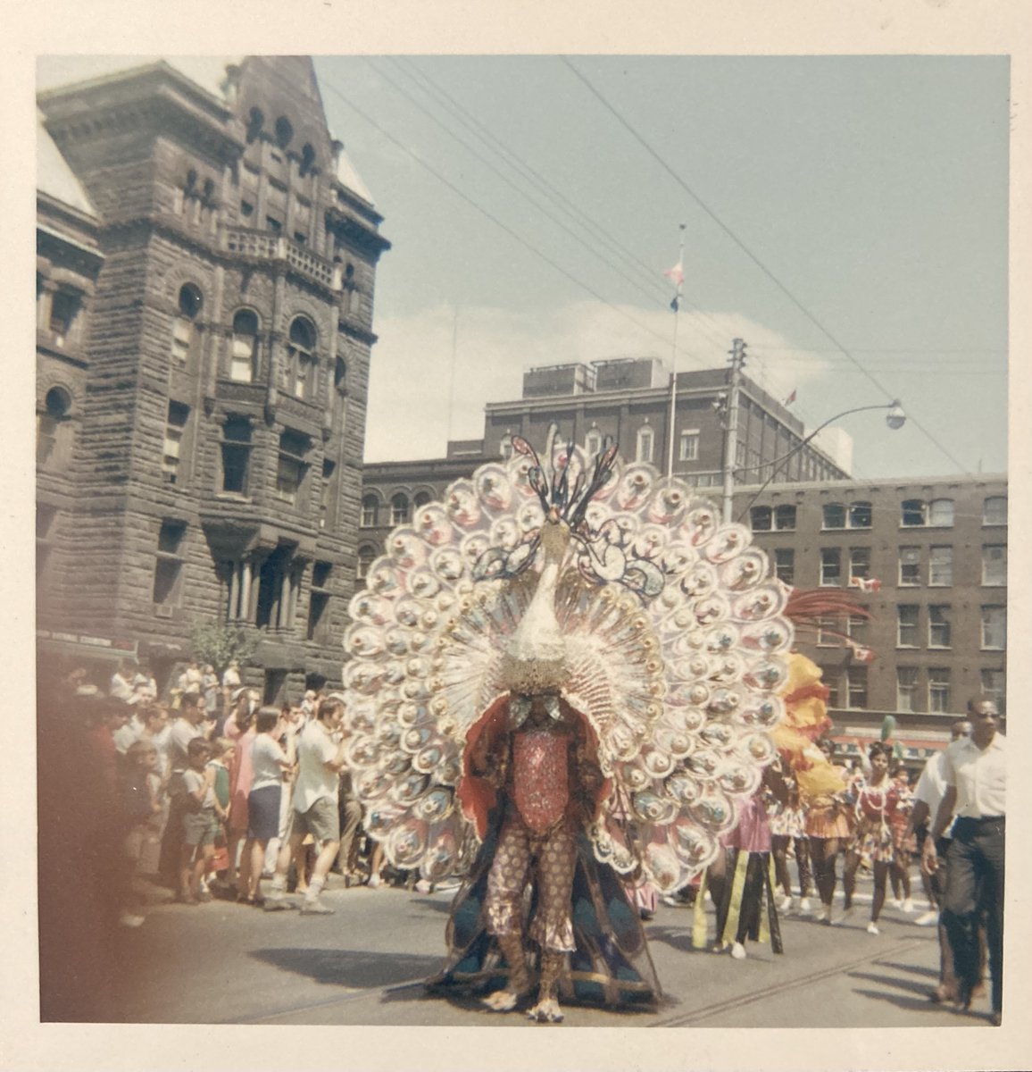 TorontoArchives's tweet photo. Toronto's first Caribana parade August 5, 1967. A spectacular display of costume, colour, liberation, & commemoration of the full Emancipation of enslaved people in Canada in 1838. #TOcarnival #CaribbeanCarnival https://t.co/Zy7cVPcjke https://t.co/Eu7sQR4cq3