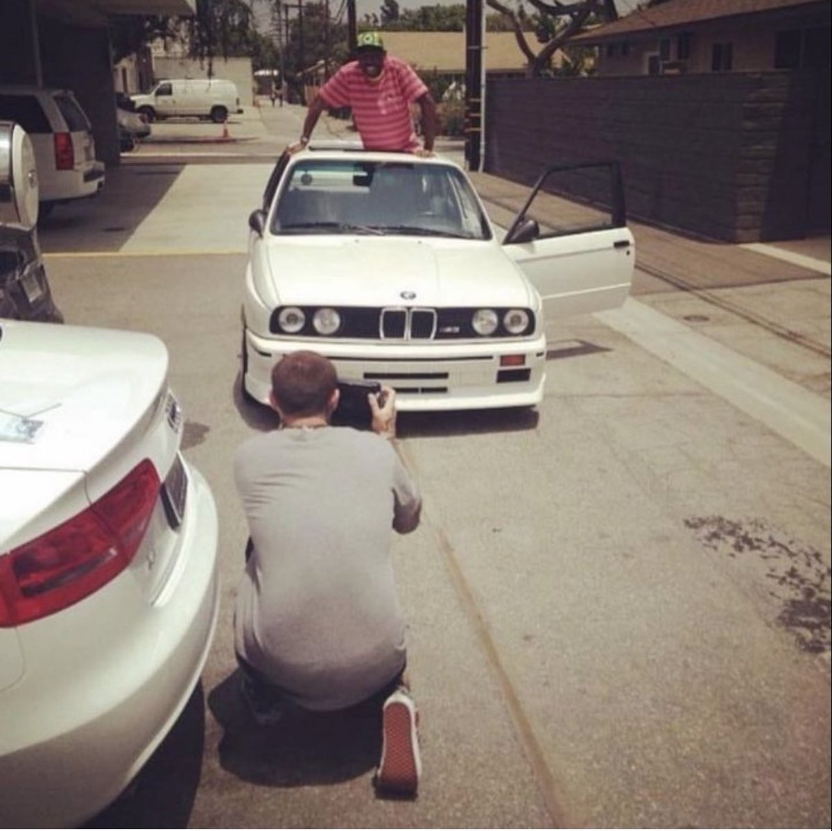 saint's tweet photo. Mac Miller taking a photo of Tyler, the Creator &amp; his BMW E30 https://t.co/DNazQgp8HF