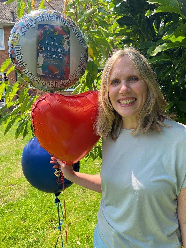 saracategreen's tweet photo. 2 weeks since #publication and 122 yo #NoraW has been spotted in bookshops, graced balloons &amp; a cake, been interviewed in the UK, France &amp; Oz &amp; rubbed shoulders in Kindle bestseller charts with royalty such as @MarianKeyes, @katemosse &amp; @KMFollett. She's having a ball &amp; so am I! https://t.co/9Sun5T5saG