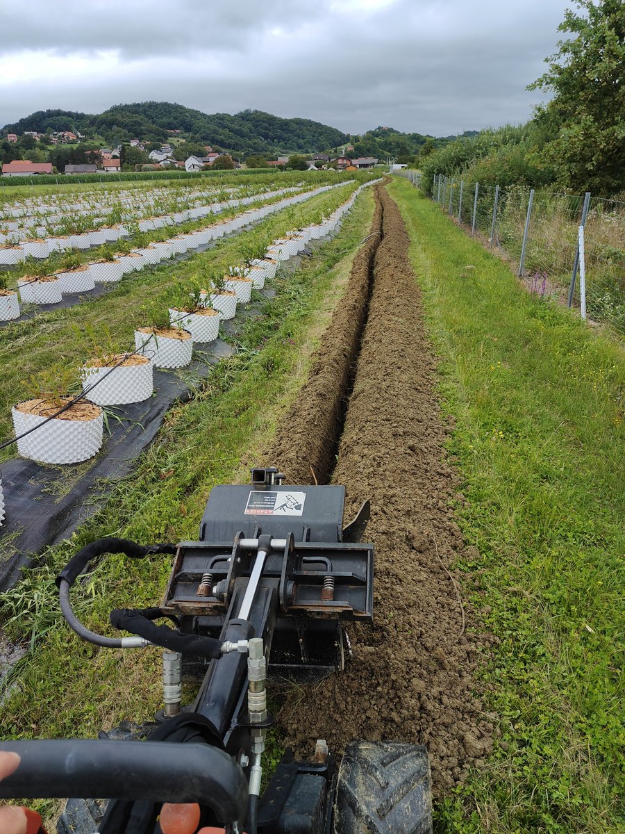 qtech_design's tweet image. Master of Trenches at heart, dug a record 200m trench in a photo finish before the great Zagreb downpour - yet again! 💪 When I&apos;m not engineering digital wonders at QTech Design, I&apos;m braving the elements in style. #RainOrShine #DiggingDeep #MechanicalMagic