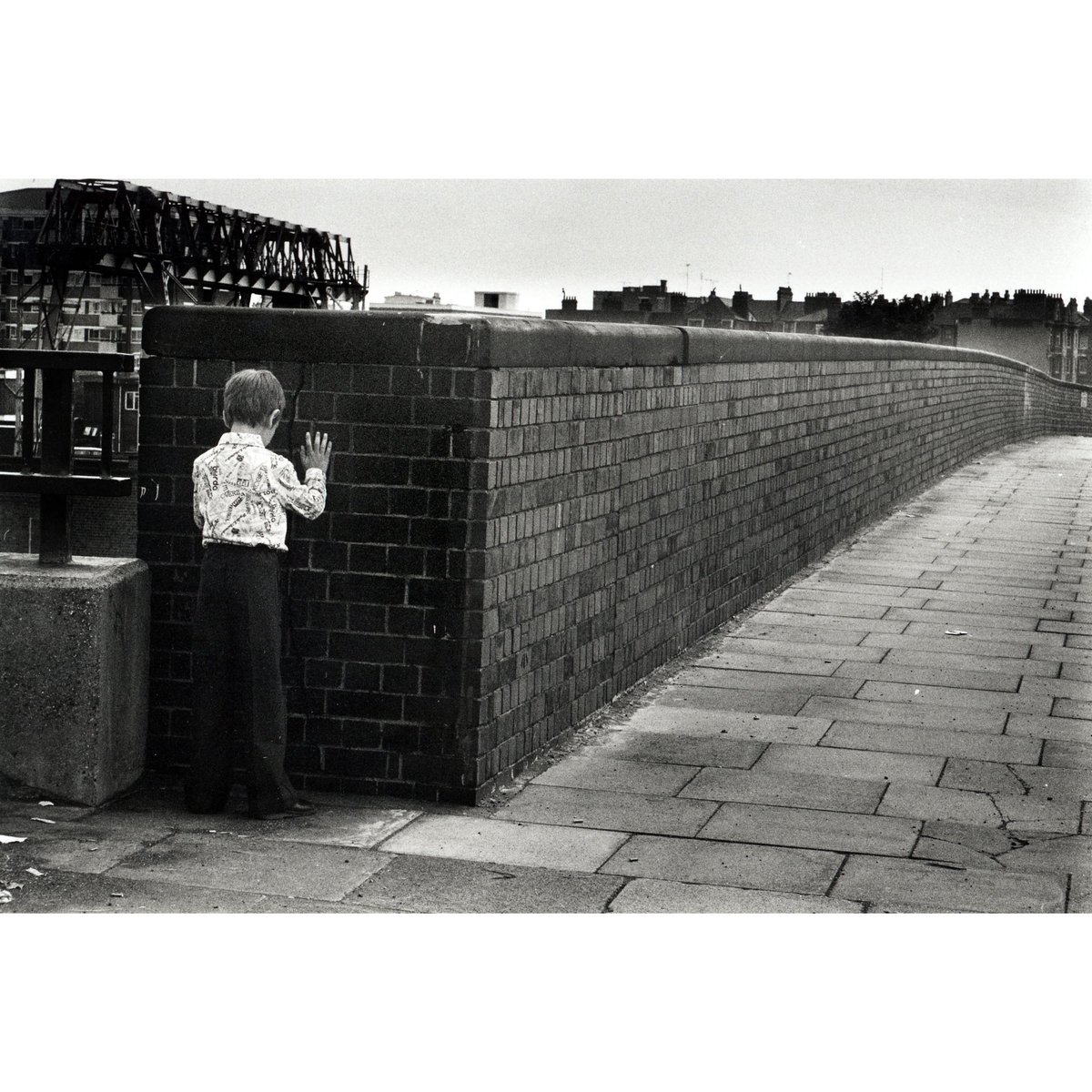 #canpubphoto #bw #blackandwhite #1970s #film #photography #streetphotographersuk #boy #wall #crack #how #light #gets #in #nofilter #nothinglikesomething