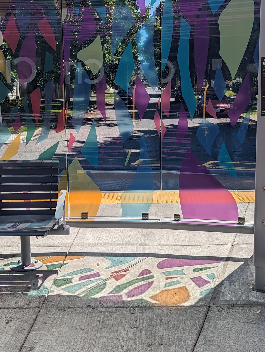 spokanetransit's tweet image. The art at City Line stations does more than just make the stations beautiful. The station glass adds extra color to the sidewalks when the sun comes out. Thanks to @MHuggins99 of @SpokaneArts for capturing this view of the artwork by @keelyhoney!

#SpokaneArts #CityLineSpokane