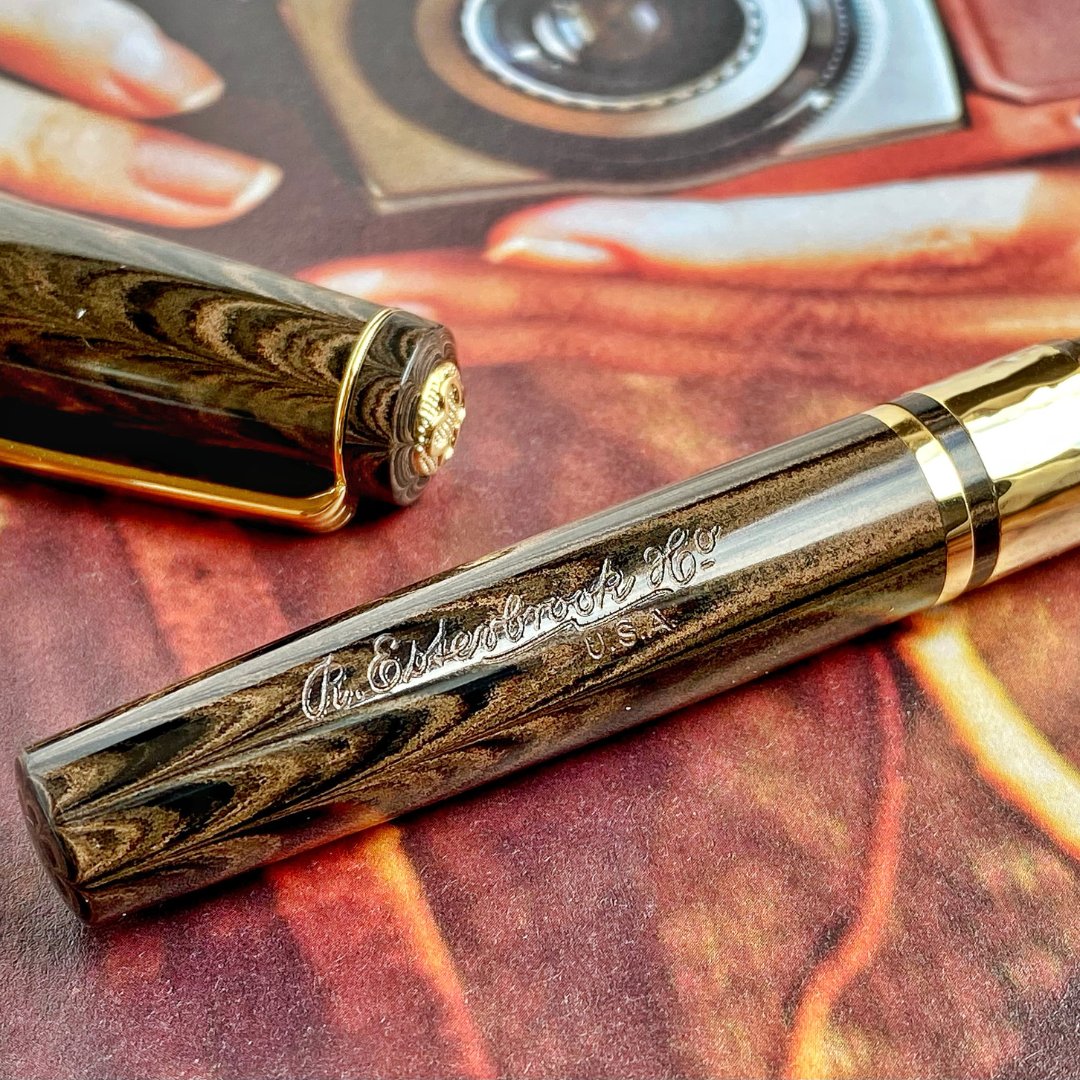 PensStudio's tweet photo. Introducing the Esterbrook Model J - a timeless masterpiece that gracefully blends vintage charm with modern ingenuity. The Model J is made of German ebonite and comes with a Jowo size 6 gold plated nib. Available now in 2 colours - Antique Rose and Lotus Green. https://t.co/O85IeLmved