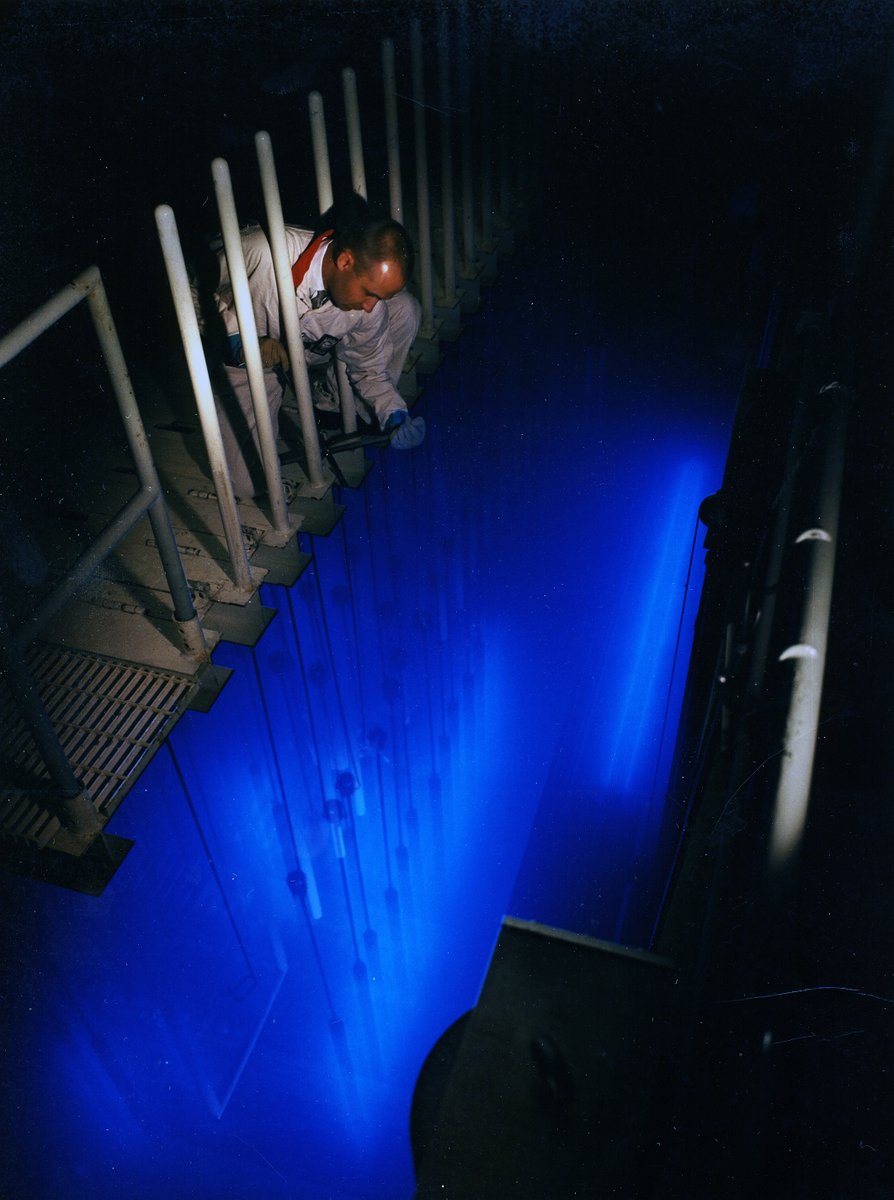 Max Freshley, Battelle-Northwest engineer, inspects the plutonium bearing fuel rods immersed in a cooling tank at the Pacific Northwest Laboratory Plutonium Recycle Critical Facility in Hanford. #ArchivesHashtagParty #ArchivesScience