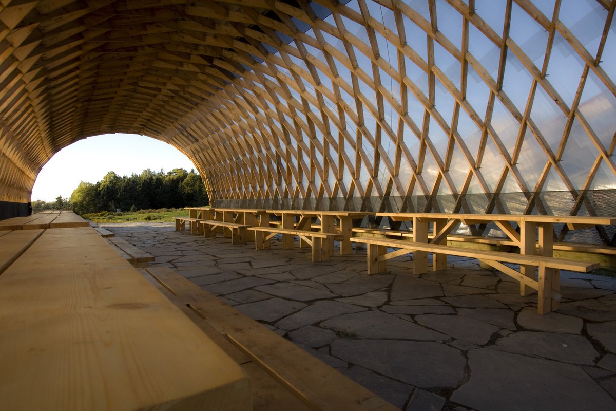 StudioNorth_'s tweet photo. The Lamella dining hall at Ross Creek Centre for the Arts is a versatile space that complements its children's performing arts camp surroundings.

Wooden natural beauty and warmth, along with polycarbonate cladding, reflects the colours of the sky to create a vibrant interior. https://t.co/9fRARzWiHA