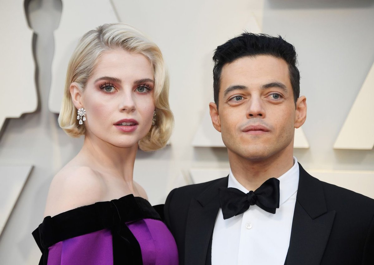 PopBase's tweet photo. Rami Malek and Lucy Boynton have broken up after 5 years, The Sun reports. https://t.co/I2ZxVul4ZP