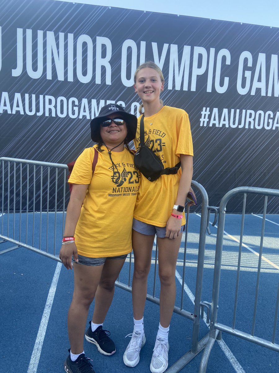AFlopsuni's tweet photo. Alyssa and teammates mom set a goal a few years ago and Alyssa has reached it! Alyssa can now high jump over Becky’s HEAD! ✅Celebrating with a pic at the junior Olympics ! #AllAmerican  #highjump #mvtc @Schroeder_A22 https://t.co/AgXVYclgmB
