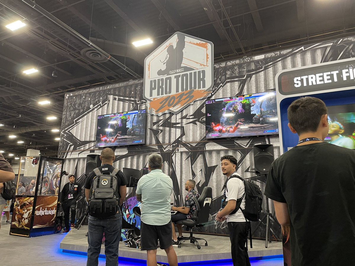StreetFighter's tweet photo. Stop by the Capcom Booth at #Evo2023 for various activities and prizes! Here’s what we got going on today.

✏️1PM - Poster signing with @AleksLeVO 
💬 3PM - Developer Panel on Main Stage
⁉️Trivia Questions
🎮 Games, games, and more games! https://t.co/mwvNMaJkJE