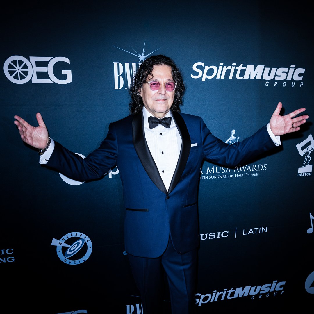 Celebrating our co-founder and 2022 inductee Rudy Pérez, the 'Latin Hitmaker', at the black carpet of the Latin Songwriters HOF/ #LaMusaAwards. His lasting legacy and dedication continue to shape Latin music and inspire us. #RudyPerez #TheLatinHitmaker #LatinSongwritersHallOfFame