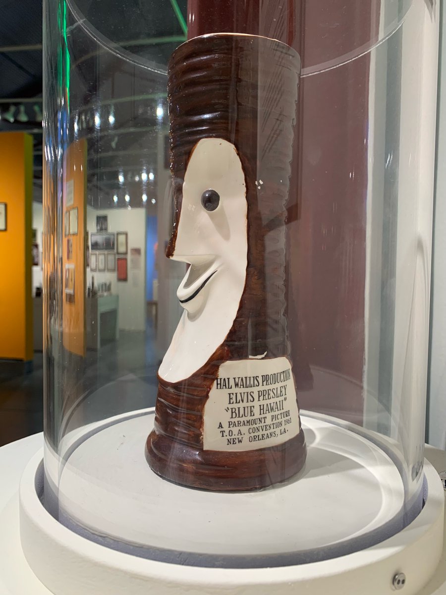 Elvis and Blue Hawaii go Tiki! This 1961 "Tiki Bob" mug was commissioned to celebrate the release of Paramount's "Blue Hawaii" film. Celebrate with us at our August 19 "Elvis Blue Hawaii Celebration &amp; Wedding Vow Renewals" and our "Tiki Dreams" exhibition conta.cc/3OGSY2Q