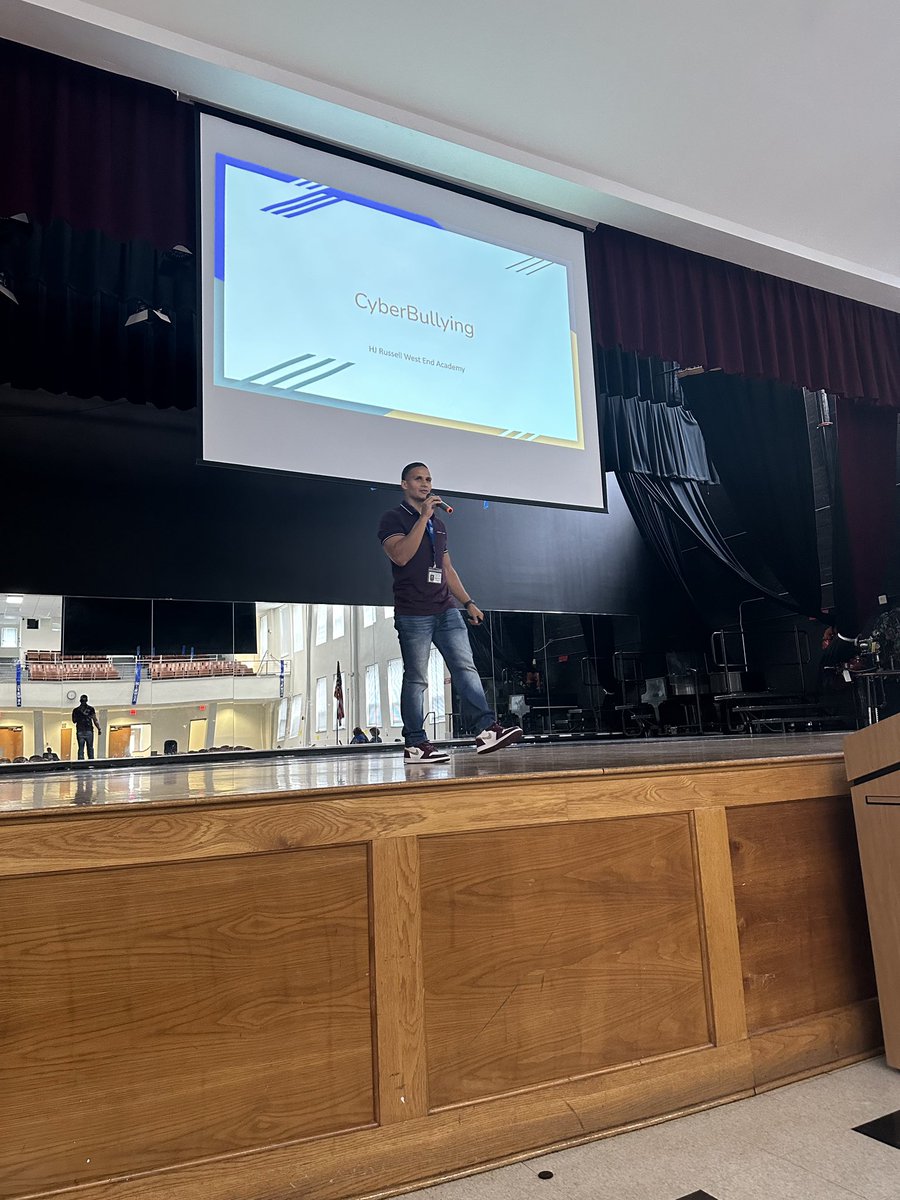 apssocialworker's tweet photo. Our amazing Social Worker, Anthony Brown, is setting the expectation early that @APSHJRUSSELL will be a safe space for students! Anti Cyberbullying assembly sponsored by CHRIS 180 @CHRIS180_Change and Big Brother Big Sister! #SocialWork #StartStrong https://t.co/l5AJbxxxgO