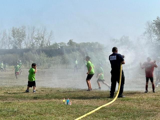 DFR was very excited to be asked back to beat the heat at this years Soccer Camp. Not sure who enjoys it more, the kids who get a cool down, or our members who get to use the nozzles in a non-fire way!