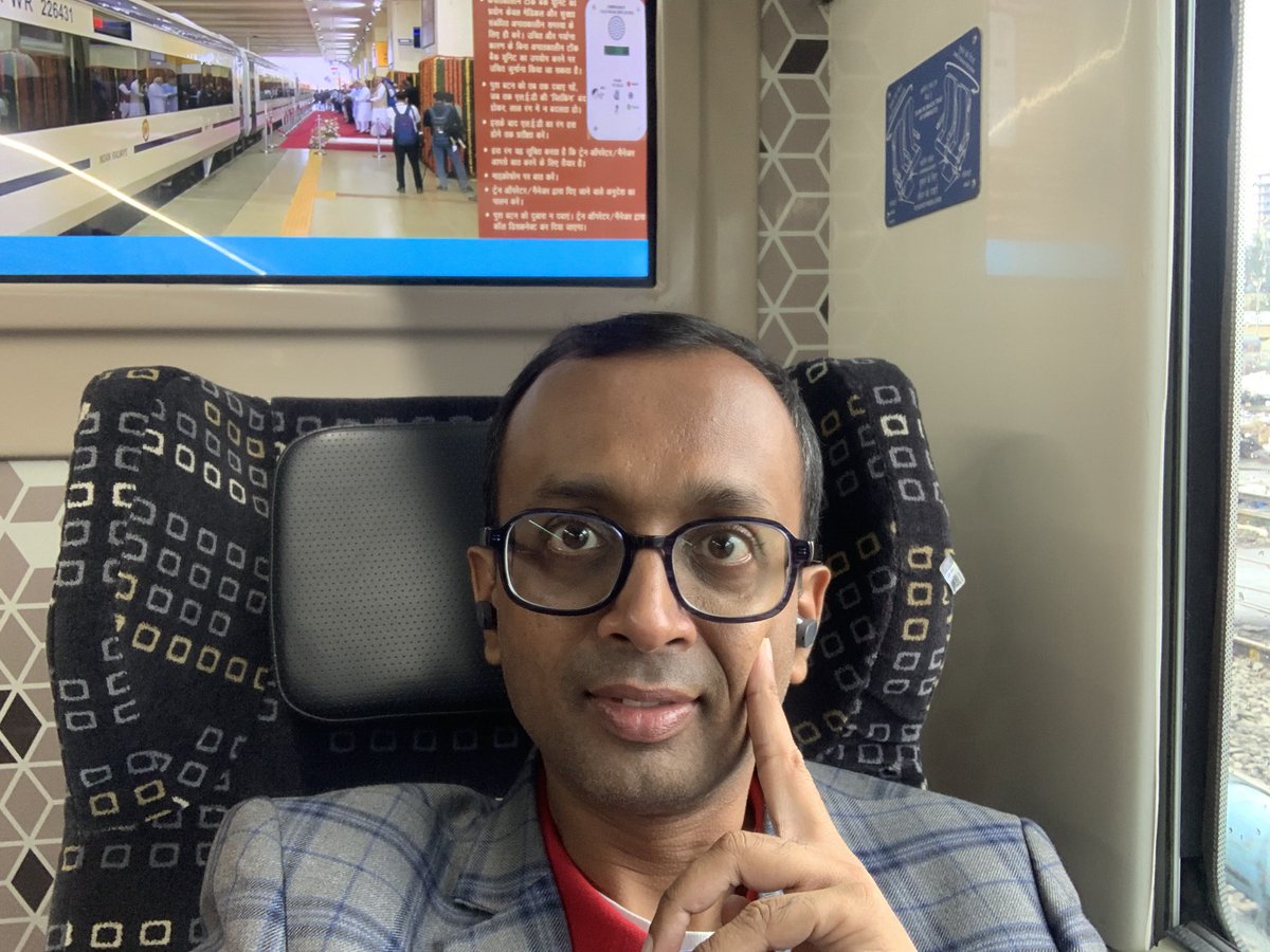 My maiden trip in All Indian Vande Bharat. Raining and Lataji singing. 
I am loving it!! 
Feeling so proud indian today !