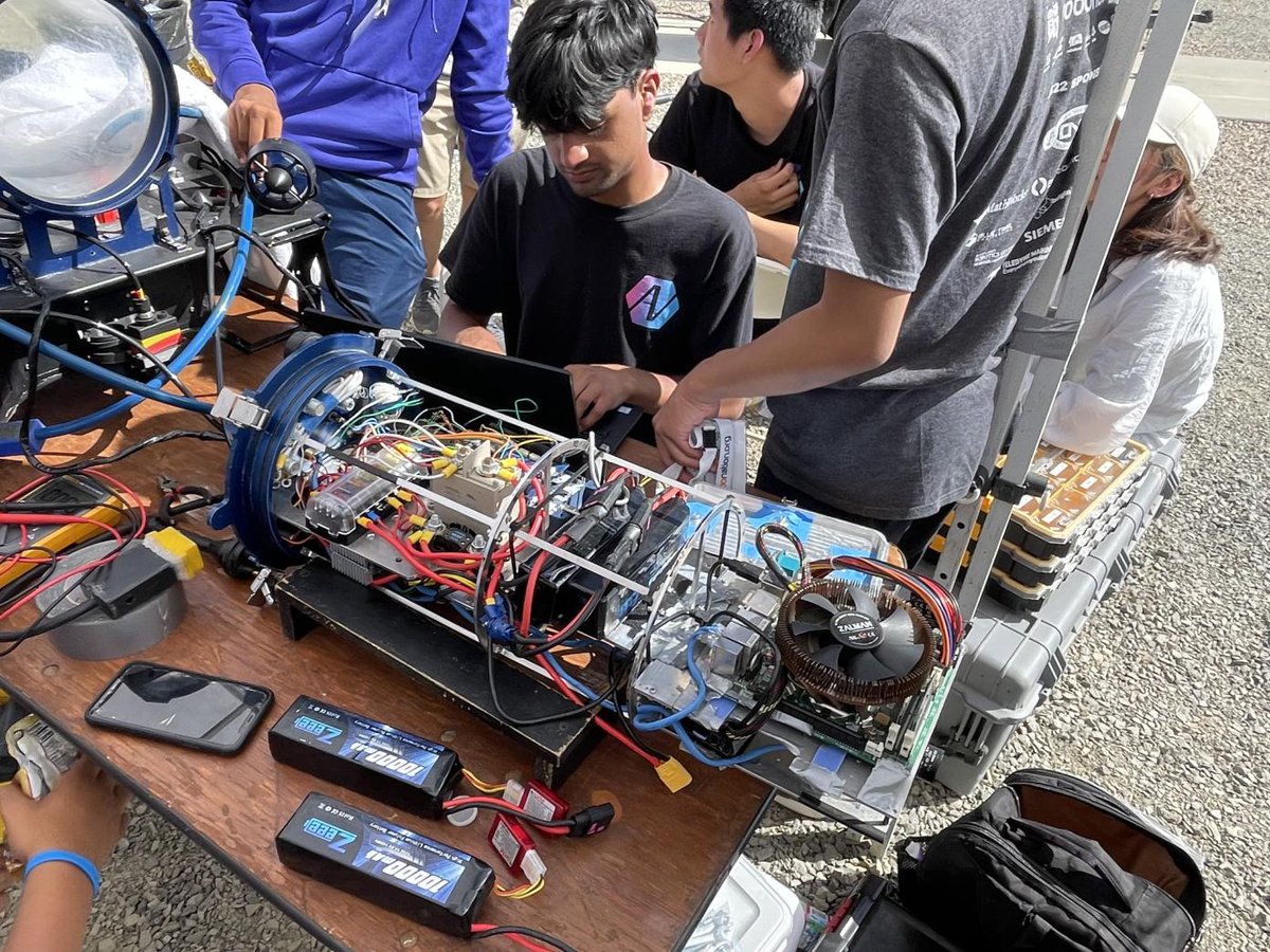 AVBotz's tweet photo. Competition Day 5:   

Photo 1: Members getting Marlin ready for pool testing

Photo 2: Kush editing Maritime code for new ESCs  

Photo 3: Allen soldering the nucleo

Photo 4: Eaton installing news ESCs from Blue Robotics

See you tomorrow! https://t.co/UDOHF59Os1