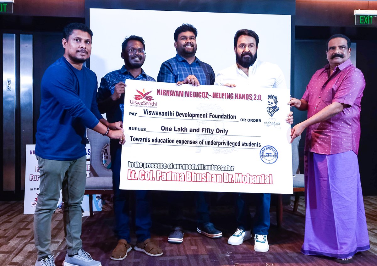 Mohanlal's tweet photo. Privileged to be part of the 7th-anniversary gathering of Nirnayam Medicoz. Grateful to have flagged off the free medical camp for tribal health as part of Swasthya Medical Outreach in association with the @ViswaSanthiFndn and for the valuable alms towards the foundation's efforts. Wishing you God's grace and will to accomplish more feats and spread more smiles!