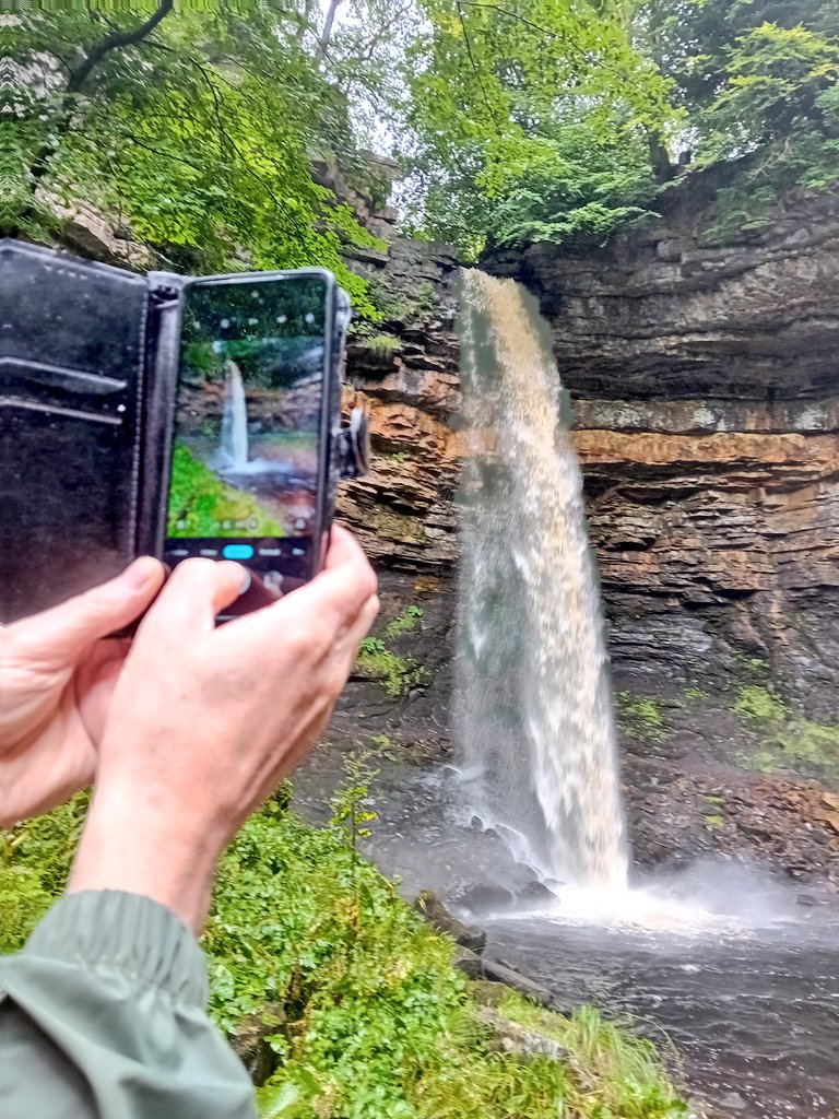 SanjeePerera1's tweet photo. #HardrawForce waterfall, with a 100-foot drop, is home to the oldest record of amphibian tracks in the UK dating back 340 million yrs.  The rocks of the gorge also include marine beds where some lovely productid brachiopods can be spotted! #FossilFriday #SabbaticalLife https://t.co/Roq9QHeRcd