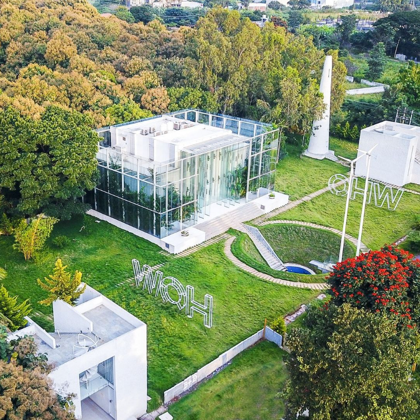 ThomasAbraham_'s tweet photo. The Crystal Hall: A work by me where sustainability meets architectural brilliance.

This eco-conscious marvel redefines green living with its innovative design, locally sourced recycled glass, and zero-waste policy. Wind power towers minimize our carbon footprint while providing backup energy. Bathed in natural light, this residential oasis harmonizes with its surroundings, as lush plants purify the air and reduce CO2 emissions.