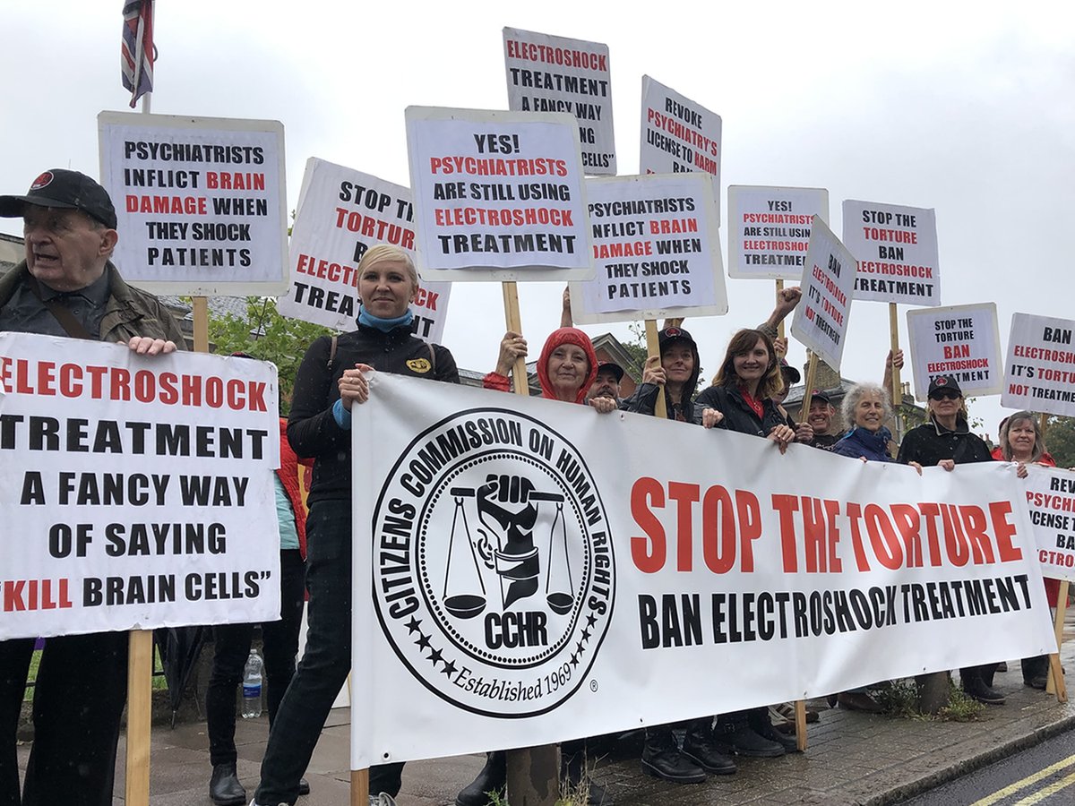 cchruk's tweet photo. It was wet outside of the Maudsley Hospital today, but that didn't matter. We were there again, exposing the brain damage inflicted by psychiatrists who use #ECT. We keep on beating the drum and eventually the hammer will fall on this psychiatric inhumanity. #mentalhealth https://t.co/OWDqxsGG24