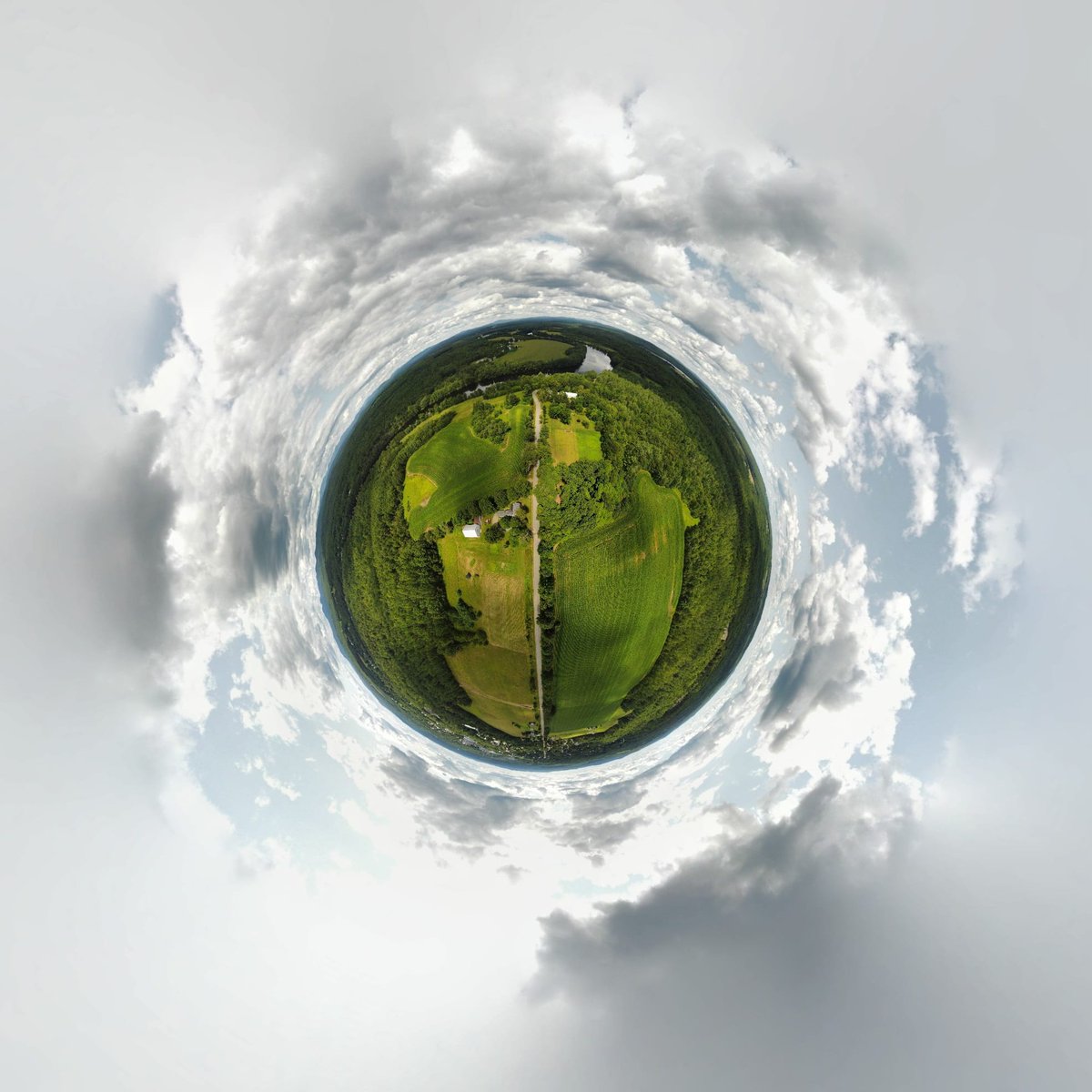 North of Madison, Maine it's a #tinyplanet. #DJI #Mini2 #spherephotography @DroneHour @AirVuz #MEwx #summer #Maine #NewEngland #clouds