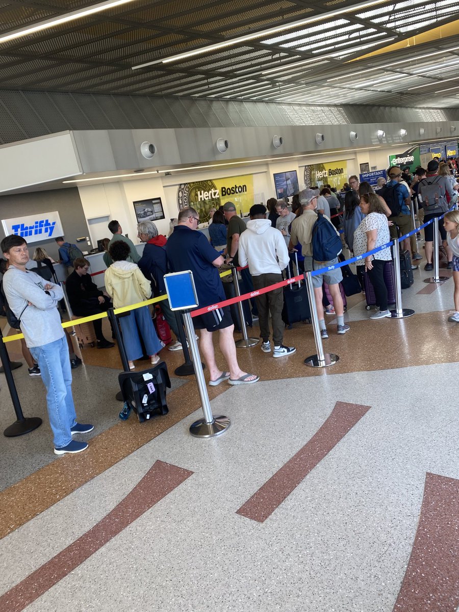 Clare39235261's tweet photo. Come on ⁦@thriftycars⁩ at Logan Airport Boston … we’re facing a two hour wait here. More than 100 people in line. https://t.co/3xlcWpXXLn