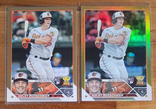 SwapTheCard's tweet image. Keeping one, selling one, which do you pick for your PC? Gold /2023 or Gold Foil

#baltimoreorioles #birdland #adley #rookiecard #topps #thehobby #baseballcards