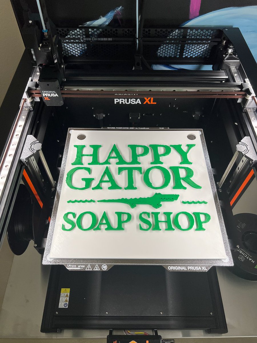 pickej's tweet photo. Full bed test on the Prusa XL was a success printing a sign for my wife's soap business. https://t.co/fkIktq3ooO