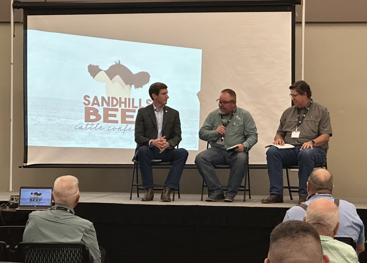 Brooks Landgraf, Warren Cude and Regan Beck giving us Legislative update on agriculture production. At the Sandhills Beef Cattle Conference at the Ward County Event Center.