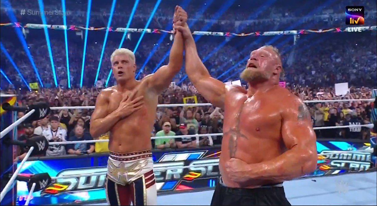 SKWrestling_'s tweet photo. The torch has been passed. 🗽
#SummerSlam #WWE https://t.co/Fn60WoutYR