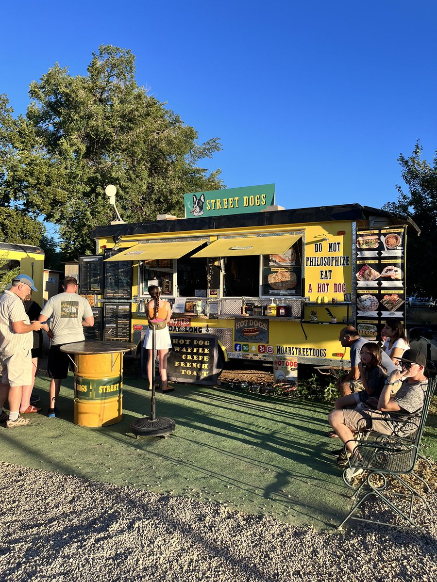 vannapresley's tweet photo. Power outage in #Moab all the way to #SaltLakeCity - Street Dogs in Moab have the only hot food in town here. Got the Slaw Dog and Wrap Dog and we are not disappointed 🌭🌭 https://t.co/WbJlILXWup