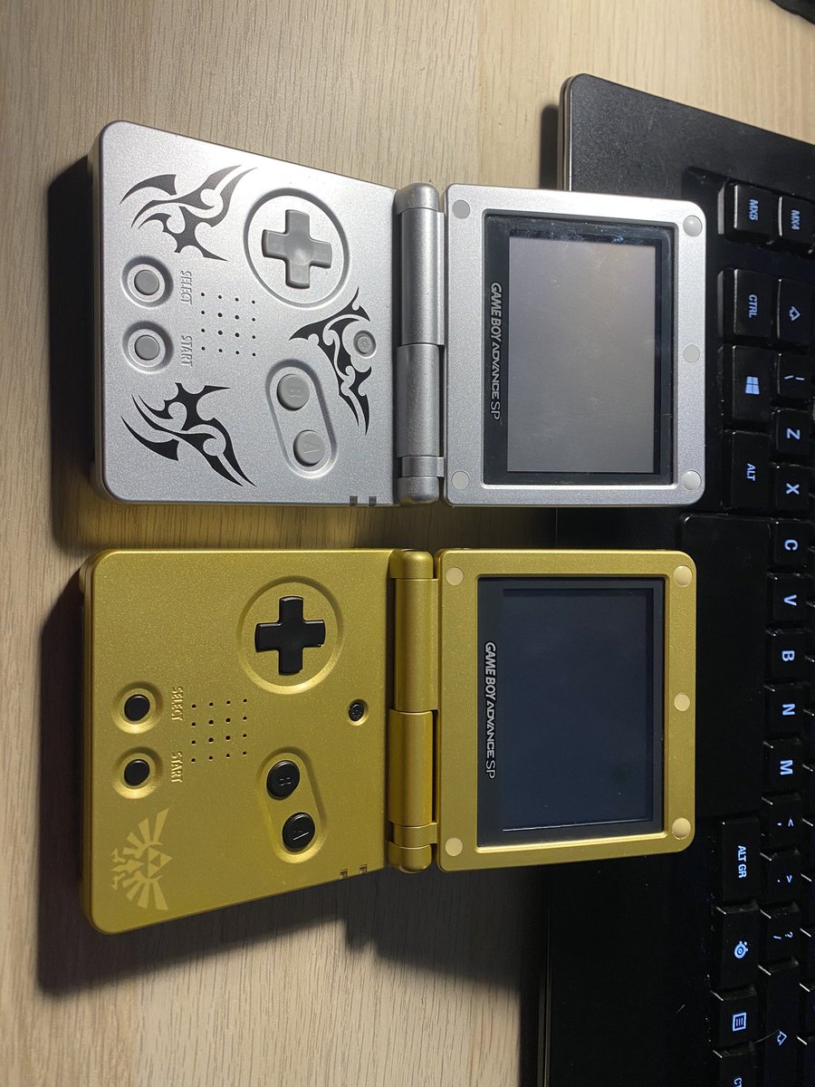 Jackarius_'s tweet photo. @johnneh Mine and my brother’s GBA SPs. 

I have many fond memories of playing by passing streetlights in the car - keeping the backlight off to save battery. Still keep mine in the bedside cabinet when I’m nostalgic to play The Minish Cap. https://t.co/1OL6x4nrbM