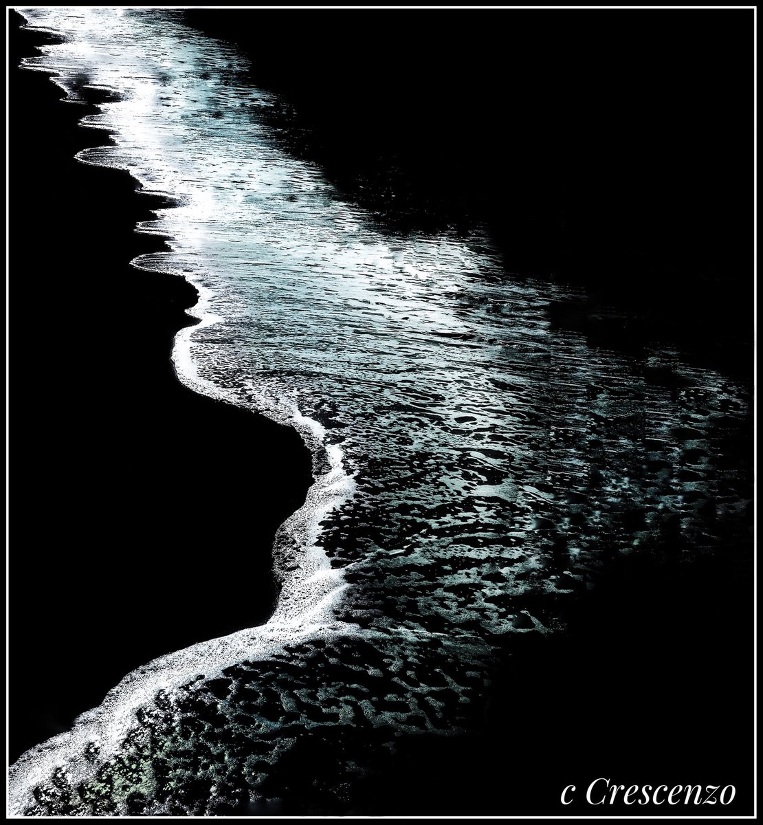 ‘Surf’s Edge’ being carved in to sand… Carmel, CA