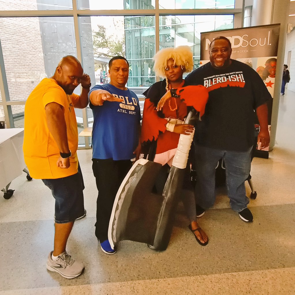 ThatNERDSoul's tweet photo. THIS WEEKEND!
#MidCityMicroCon DAY 1! Good times with @obadoro x @Blerdish1 x @markdub @gammaraecosplay
MID CITY MICRO CON: 8.5 - 8.6.23 https://t.co/lebnSVh04c
Main Library at Goodwood #MidCityMicroCon2023 #MCMC2023 #MCMC23 #ComicCon #Nerd #Blerd #BRLA #BatonRouge https://t.co/9iCYbZ8cAc
