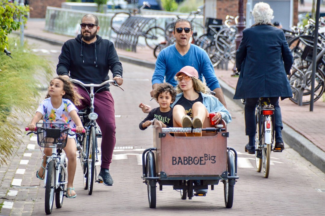 The future of transportation isn't flying cars but cycling children. 📸 @Cycling_Embass