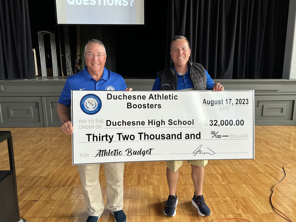 Last night DAB President Jason Boschert presented Athletic Director Paul Boschert with a check for $32,000 for Duchesne's athletic budget. Thank you DAB! Join the Athletic Boosters & you too can help support all of Duchesne's great sports programs! duchesne-hs.org/booster-member…