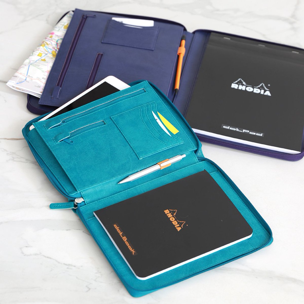 Rhodia Dot Pads feature a soft resistant coated card cover, but if that’s not enough for your daily commute then maybe the Rhodiarama Zippered Portfolio would come in handy.

#Rhodia #RhodiaDotPad #Rhodiarama