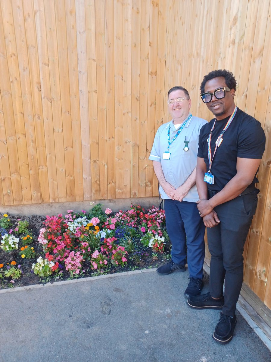 Damola and Sean proudly showing the lovely garden on Bosworth Ward, created and maintained by our patients. Inspiring hope and wellbeing every day. Well done Bosworth team! <a href="/LPTnhs/">Leicestershire Partnership NHS Trust</a> @BradgateUnit