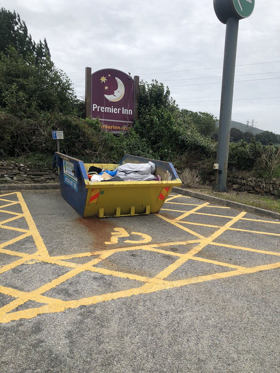 thegingerone54's tweet photo. @premierinn @CookhouseAndPub 
Could this skip have been better placed in 2x regular spaces where there are loads, rather than taking up 1 of only 5 disabled spaces? https://t.co/WVW12m3u1z