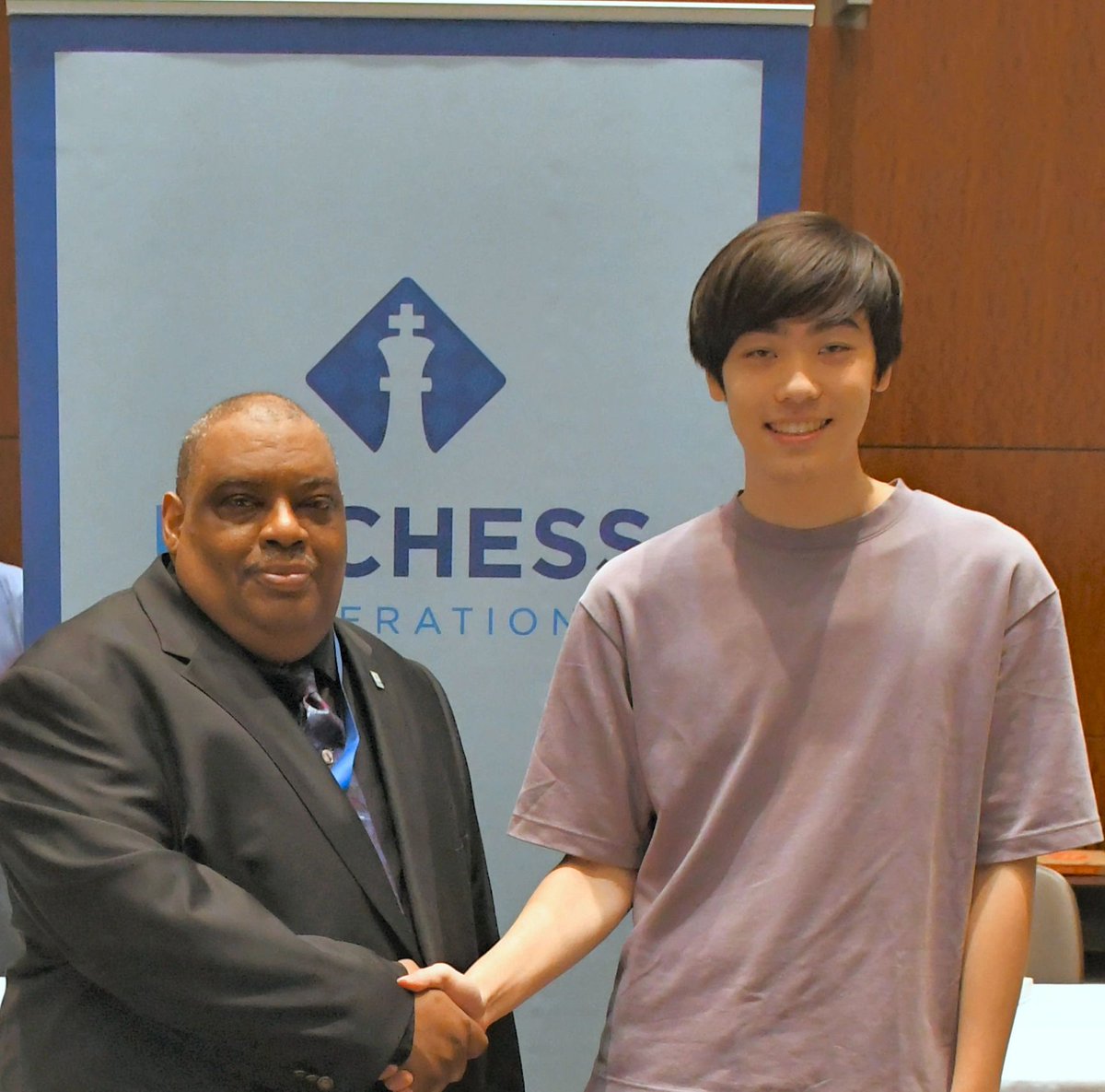 ChessEnterprise's tweet image. Chief Tournament Director Myron Thomas, NTD and Grandmaster Andrew Tang co-champion of the 2023 U.S. Open. Tang won the Armageddon playoff to win the Big Trophy.

The 123rd Annual U.S. Open was held July 29 - August 6, 2023 in Grand Rapids, MI.